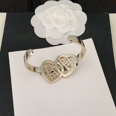 Pulseira rígida dupla oval cravejada