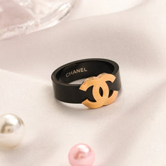 Black Wide Band Ring with Raised Emblem