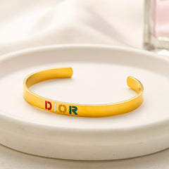 Bracelet manchette ouvert en acier inoxydable 304 avec inscription colorée