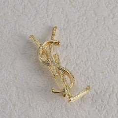 Broche con emblema de filigrana fina