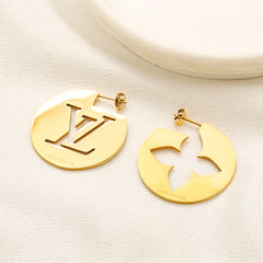 Pendientes asimétricos de acero inoxidable 304 con monograma y disco floral