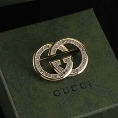Small Pave Interlocking Letter Brooch