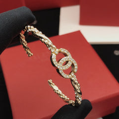 Bracelet manchette à maillons entrelacés pavés