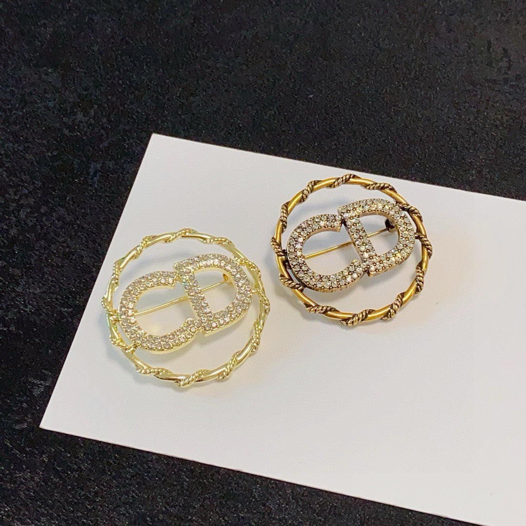 Twisted Round Frame Letter Brooch