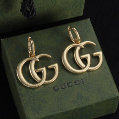 Boucles d’oreilles pendantes oversize à maillons entrelacés en G