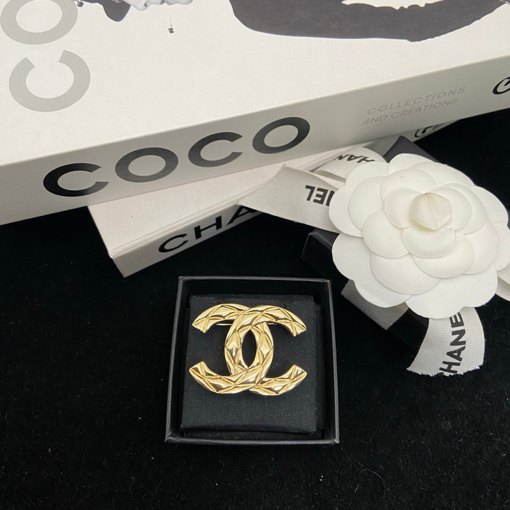Textured Interlocking Emblem Brooch