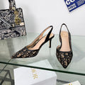 Monogram Pointed-Toe Slingback Pumps