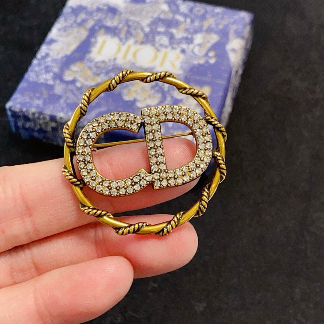 Twisted Round Frame Letter Brooch