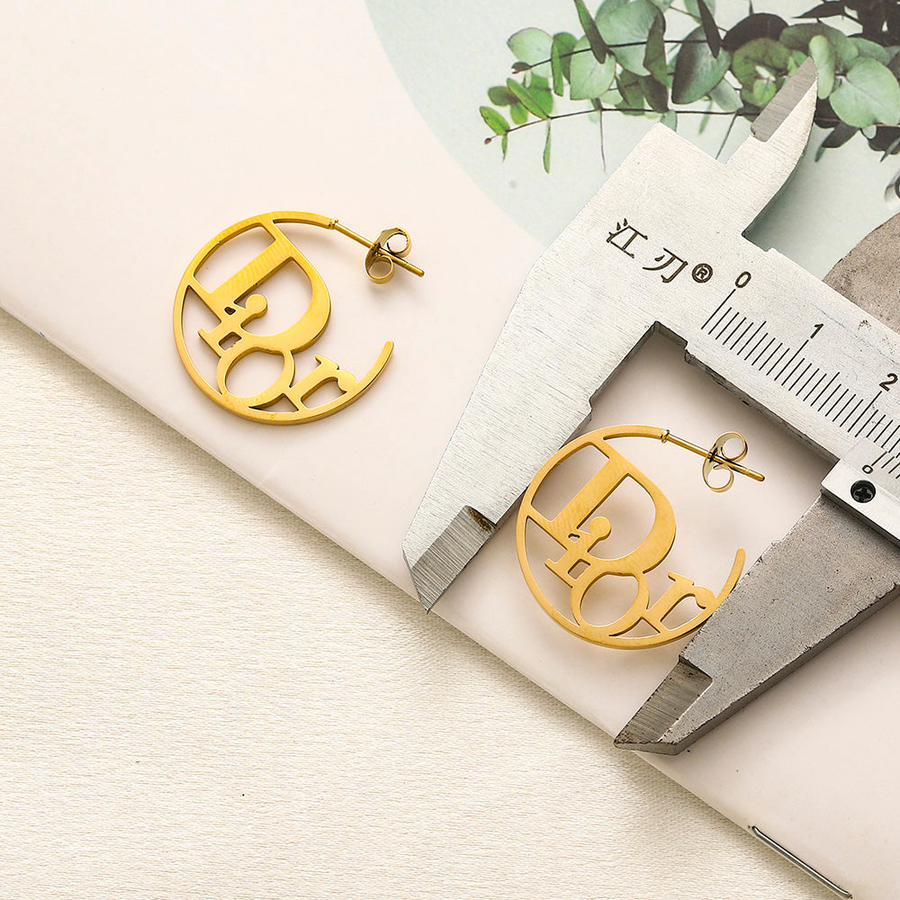 Aretes de aro con letras recortadas de acero inoxidable 304