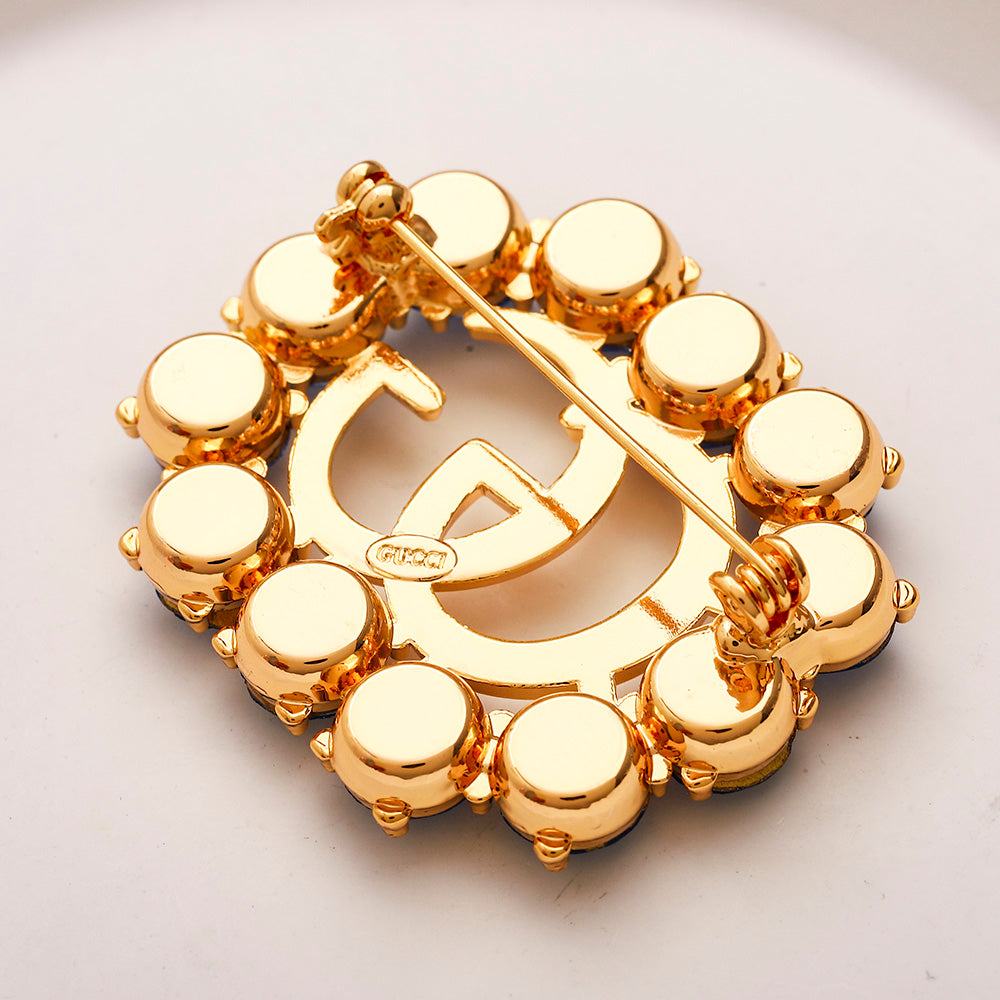 Alloy Oval Letter Brooch with Colored Stone Border