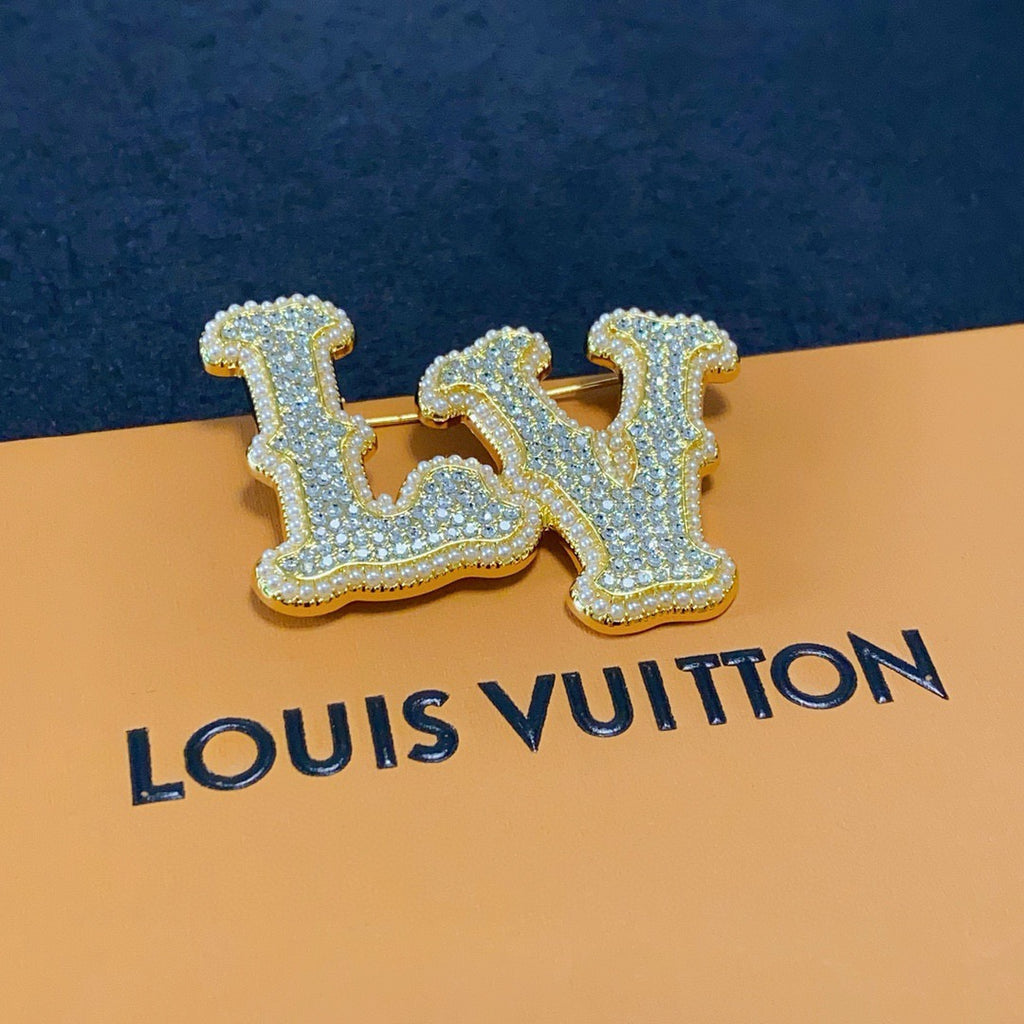 Broche monogramme en lettres cursives texturées