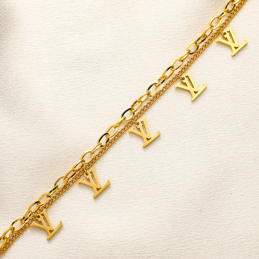 Pulsera de doble cadena con dije de monograma en acero inoxidable 304
