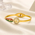 Brazalete rígido con monograma redondo y rayas de acero inoxidable 304