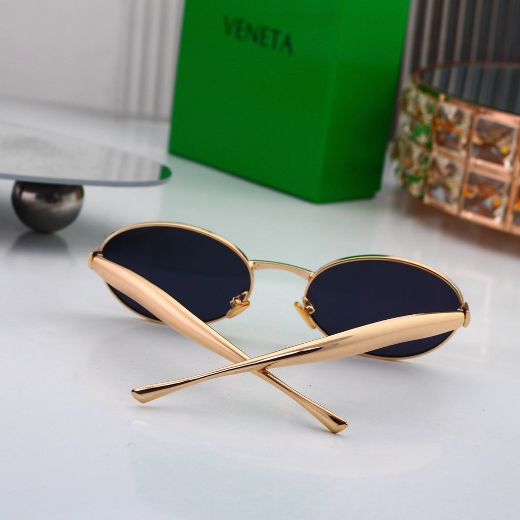 Gafas de sol redondas con patillas de metal texturizado