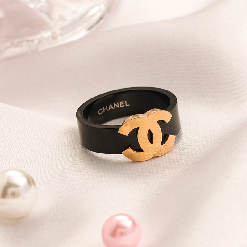 Black Wide Band Ring with Raised Emblem