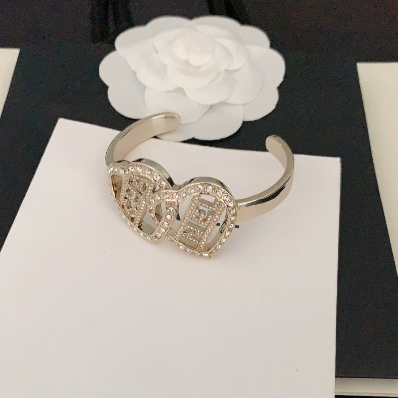 Pulseira rígida dupla oval cravejada