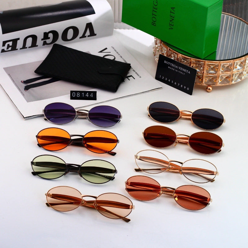 Gafas de sol redondas con patillas de metal texturizado