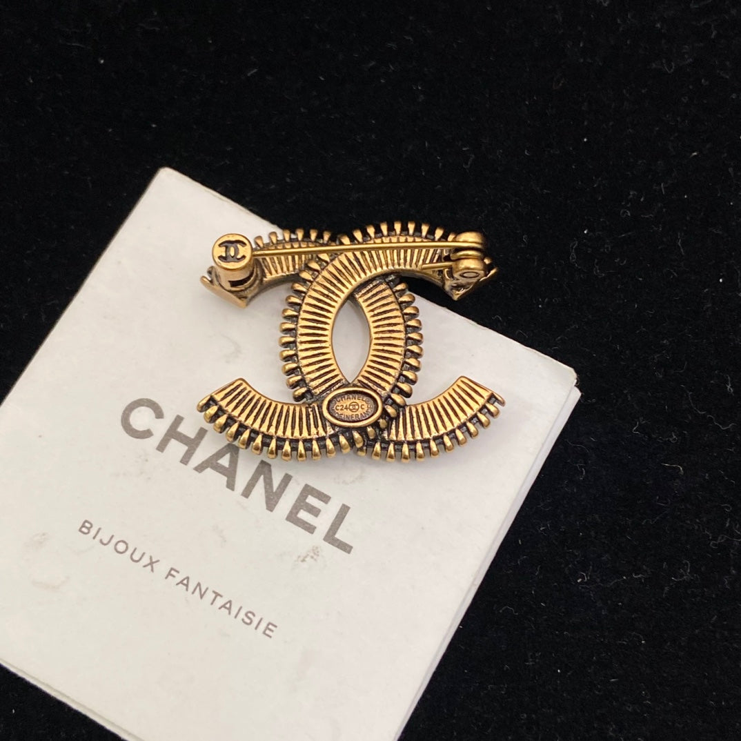 Curved Emblem Brooch with White Inlay