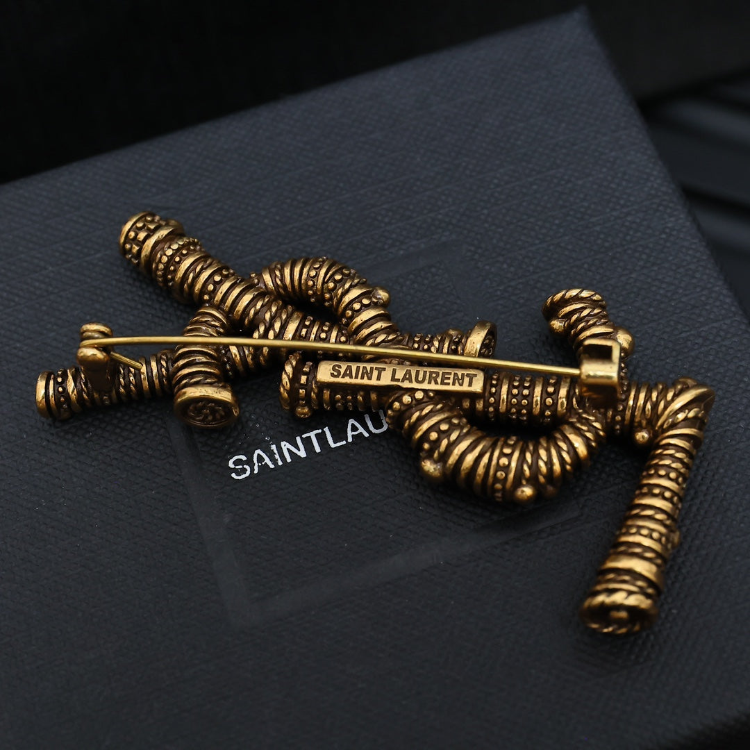 Coiled Wire Letter Emblem Brooch