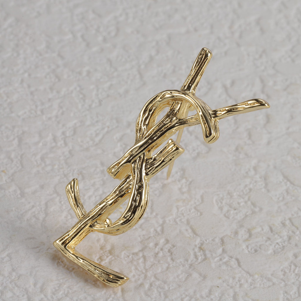 Broche con emblema de filigrana fina