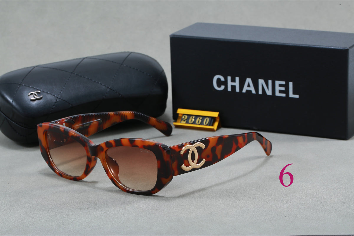 Gafas de sol cat-eye redondeadas con varillas con logotipo entrelazado