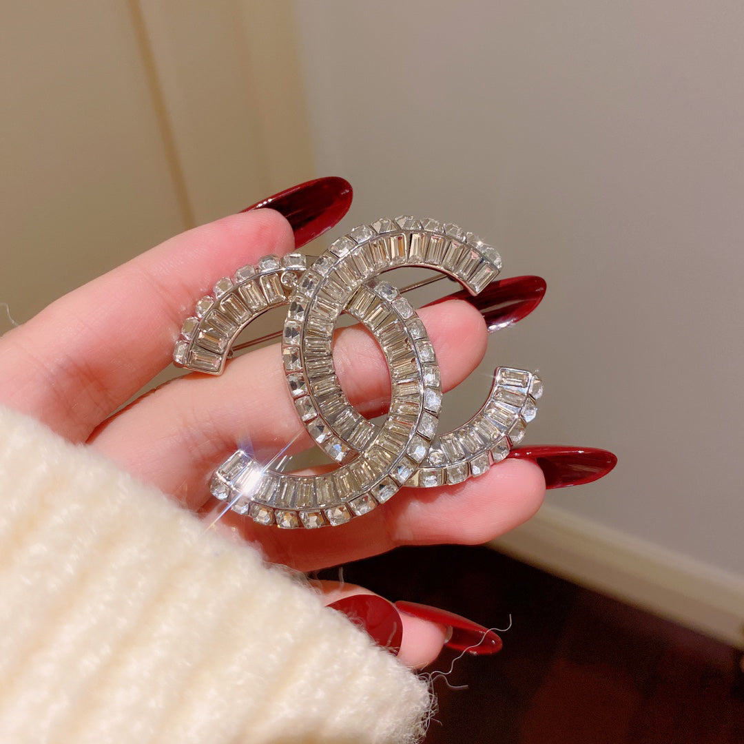 Rectangular Stone-Set Interlocking Emblem Brooch