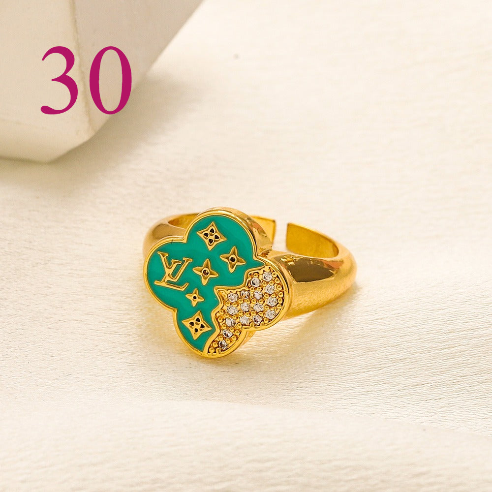 Textured Open Band Ring with Interlocking Emblem