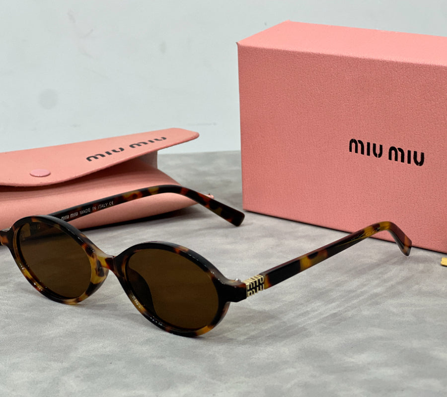 Narrow Cat-Eye Sunglasses with Swept Corners Fashion Sunglasses、New Arrivals、Miumiu Series