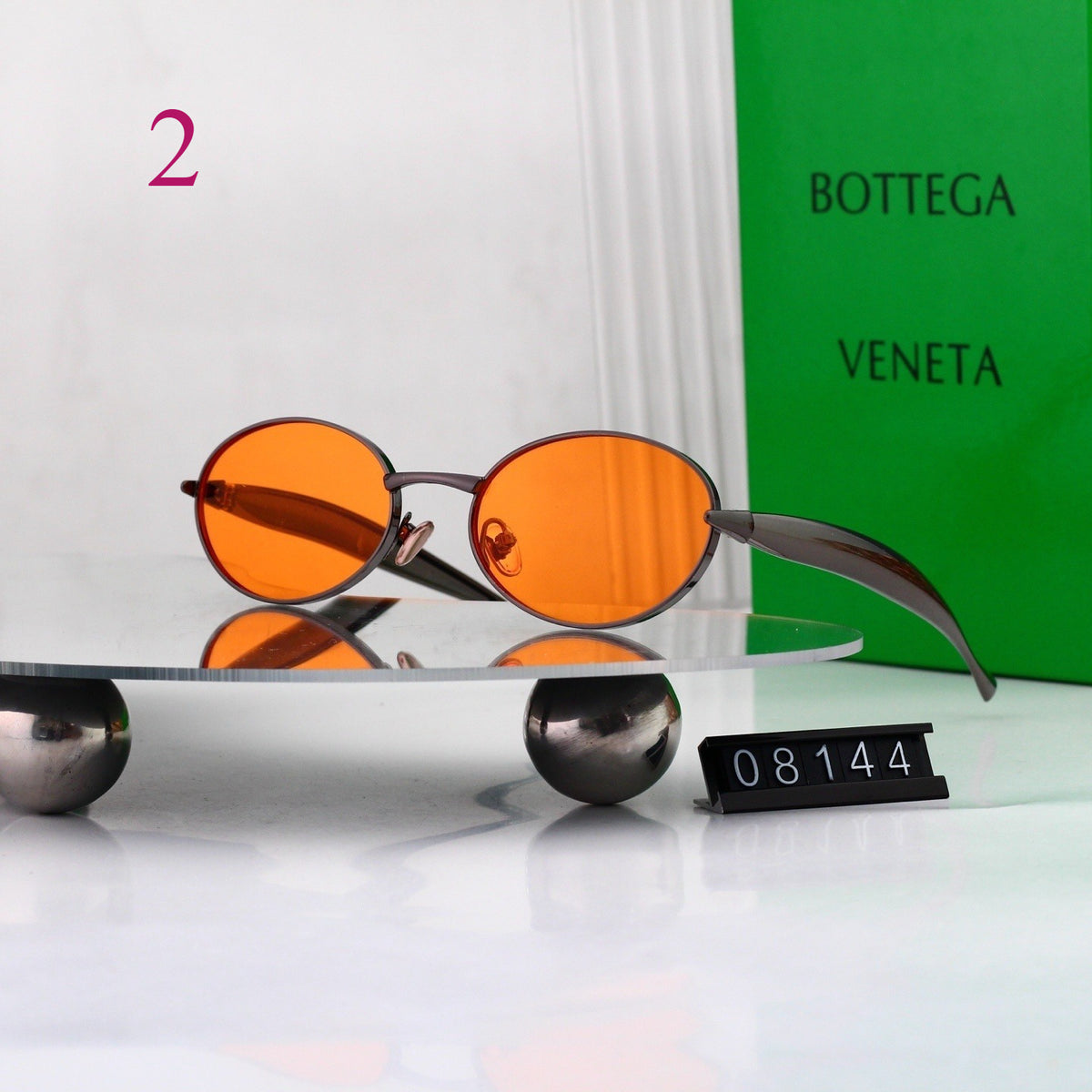 Gafas de sol redondas con patillas de metal texturizado