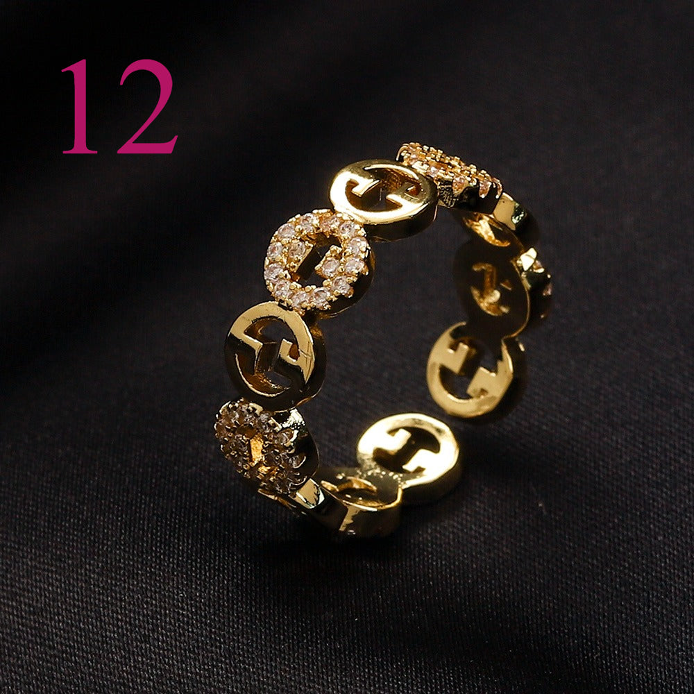 Textured Open Band Ring with Interlocking Emblem