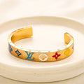 Pulsera rígida de acero inoxidable 304 con monograma colorido