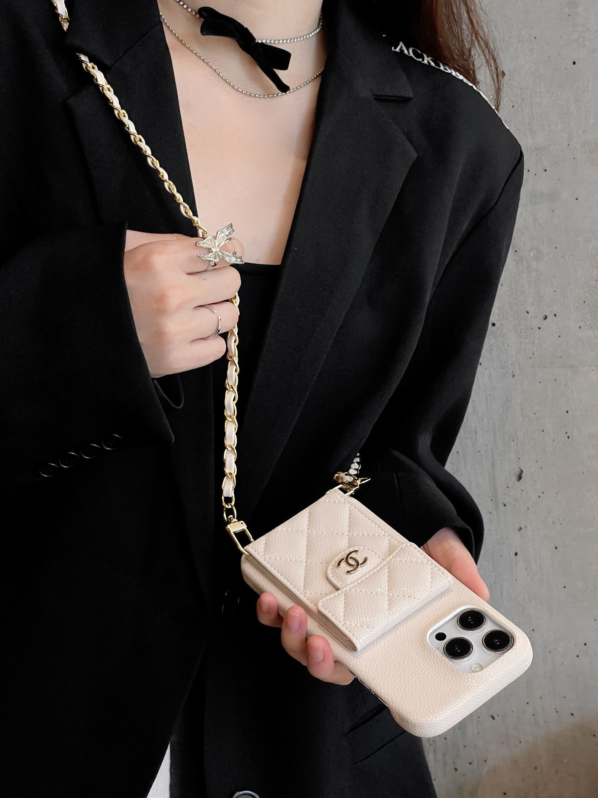 Quilted Phone Case with Emblem Clasp and Chain