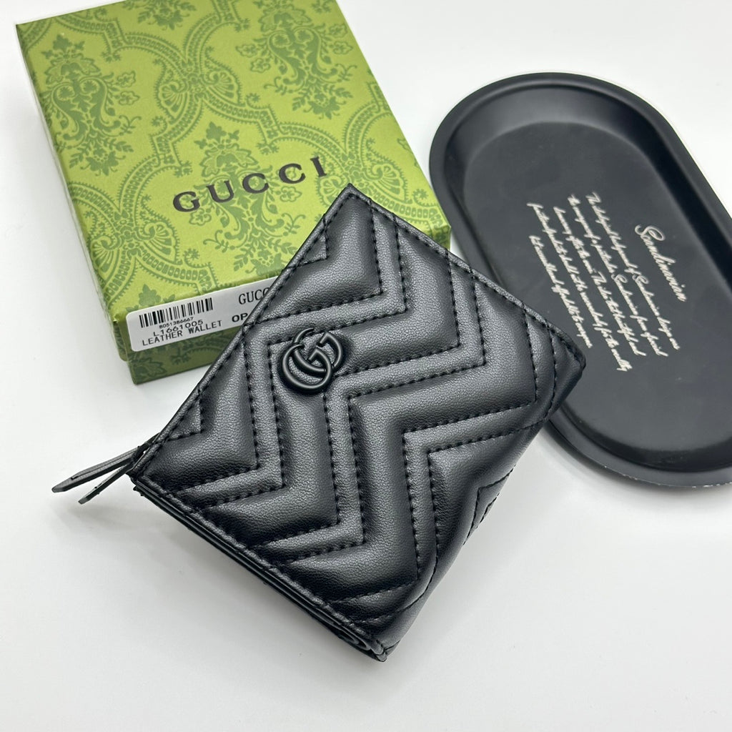 Portefeuille zippé matelassé à chevrons 009