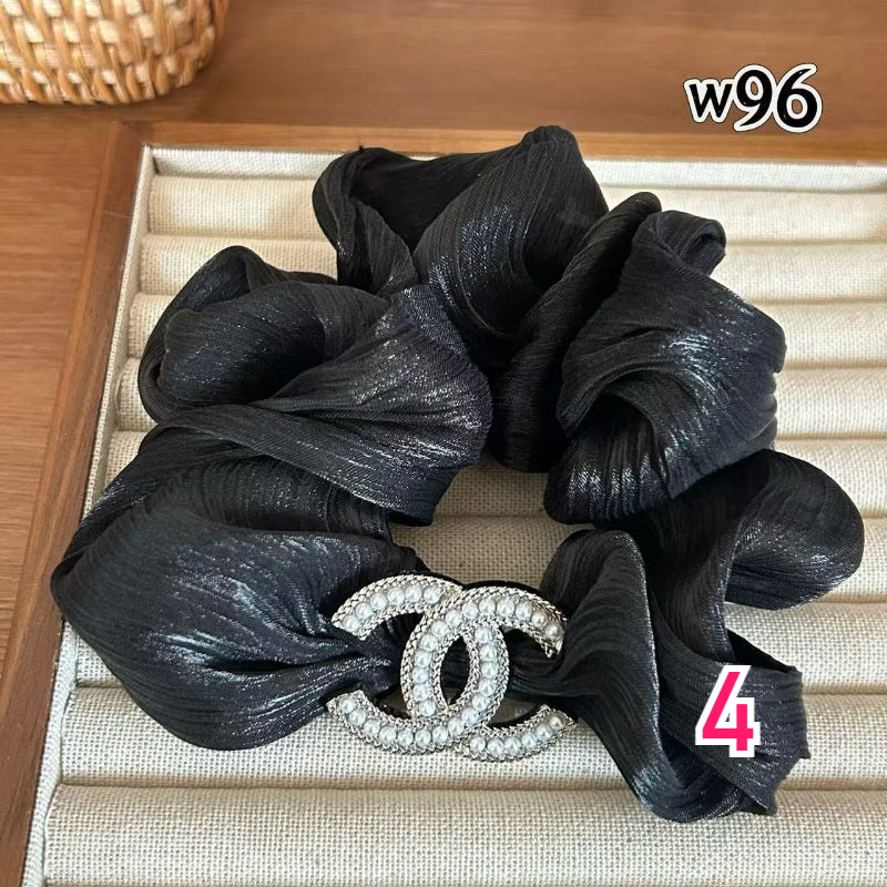 Sparkling Interlocking Emblem Hair Tie