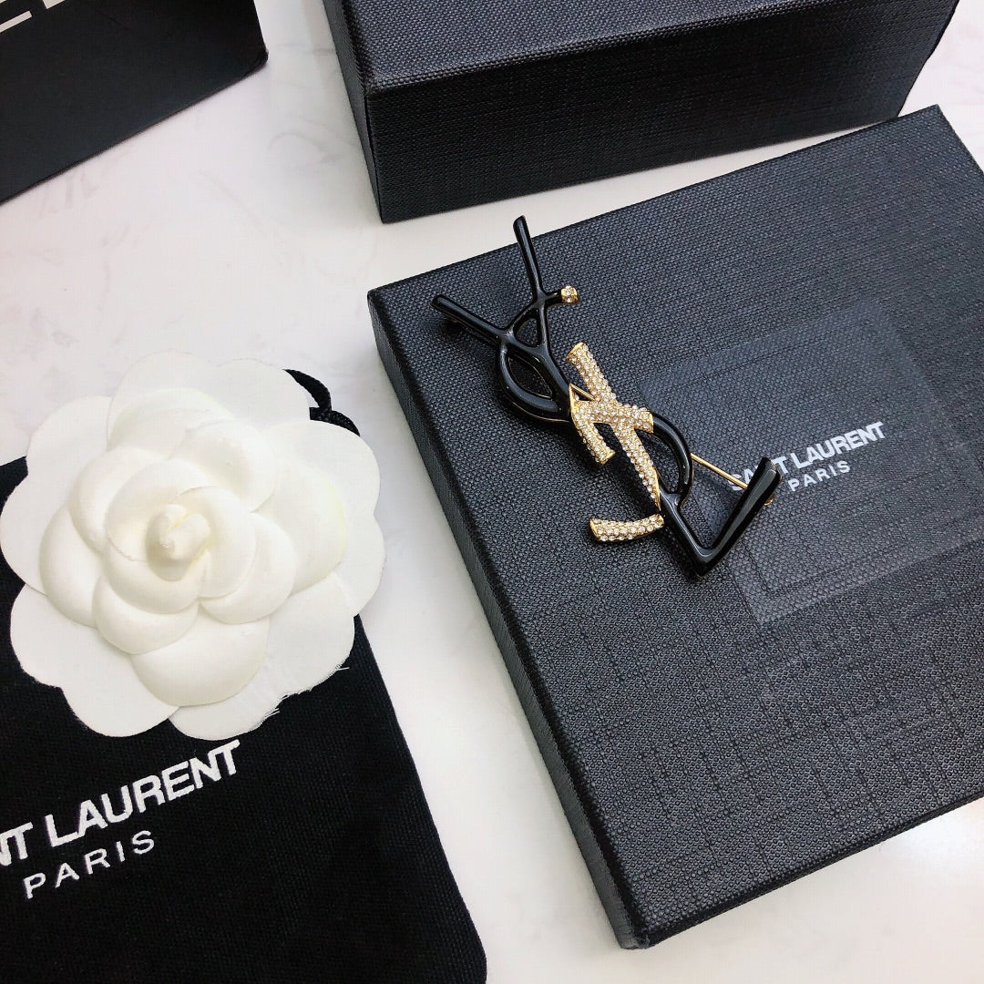 Two-Tone Openwork Letter Brooch