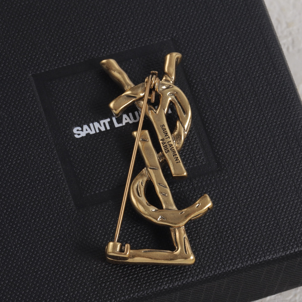 Twisted Letter Emblem Brooch
