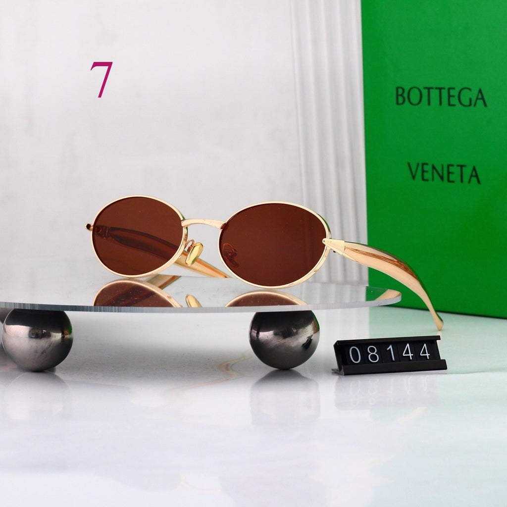 Gafas de sol redondas con patillas de metal texturizado