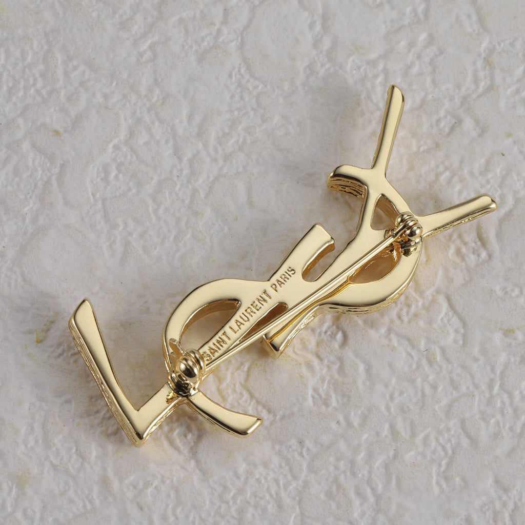 Broche con emblema de filigrana fina