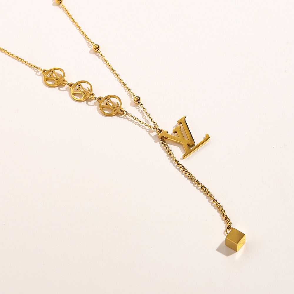 Collar tipo Y con inicial de acero inoxidable 304 y dije de corazón