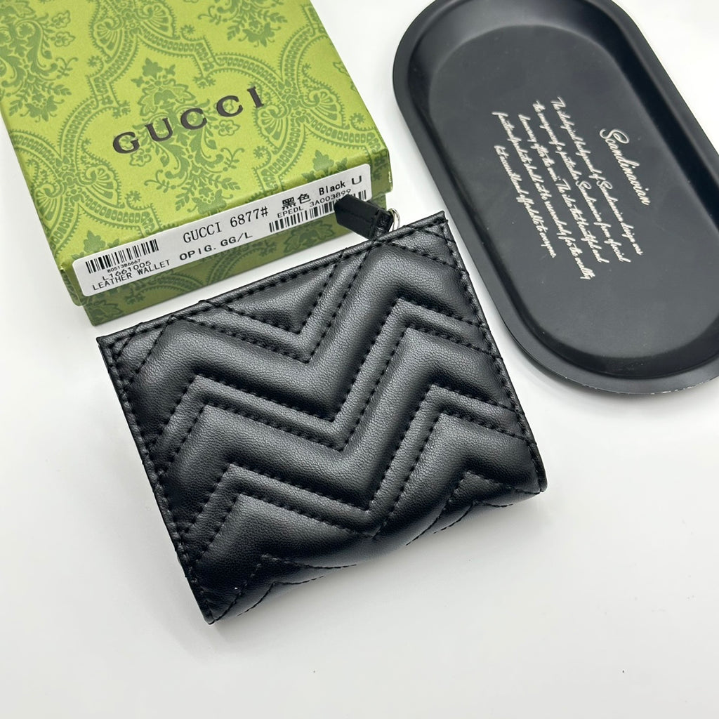 Portefeuille zippé matelassé à chevrons 009