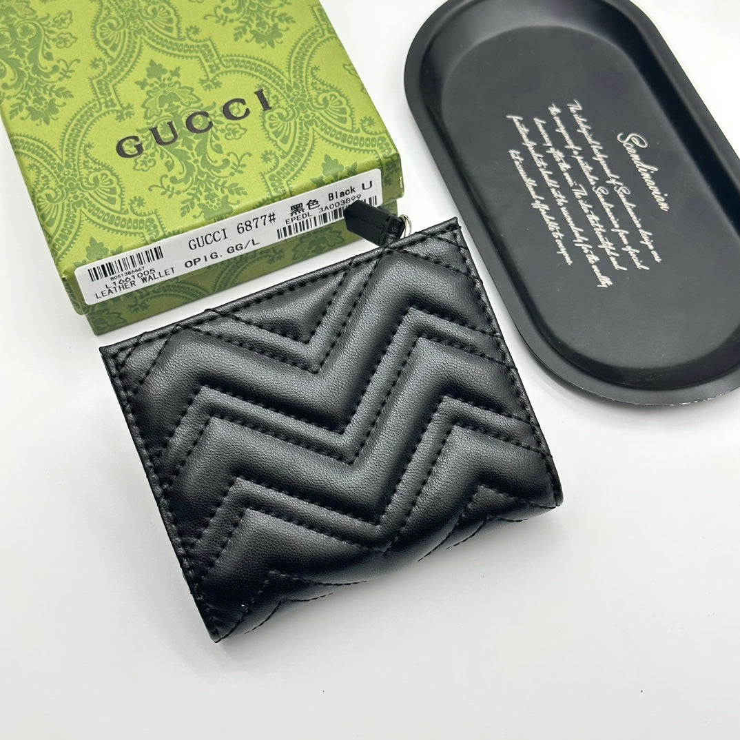 Portefeuille zippé matelassé à chevrons 009