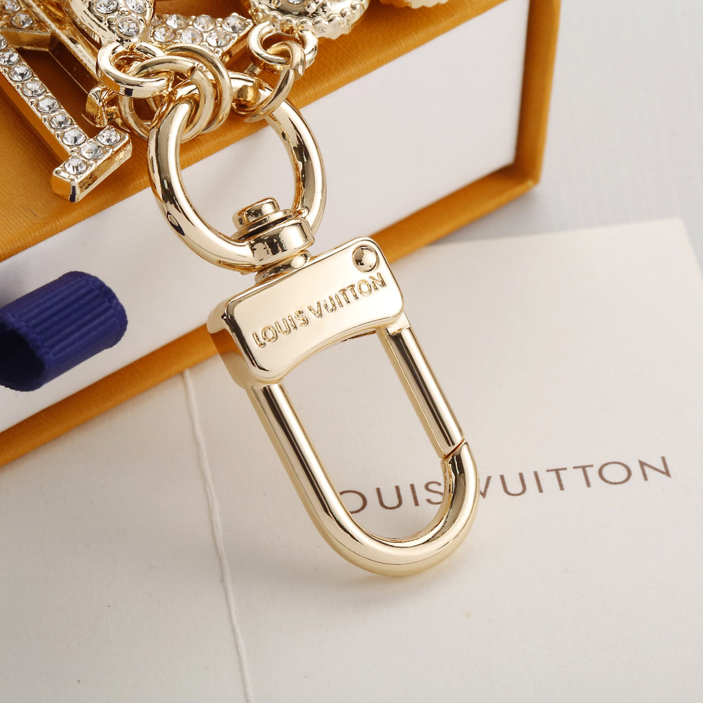 Porte-clés à breloque fleur scintillante et lettre