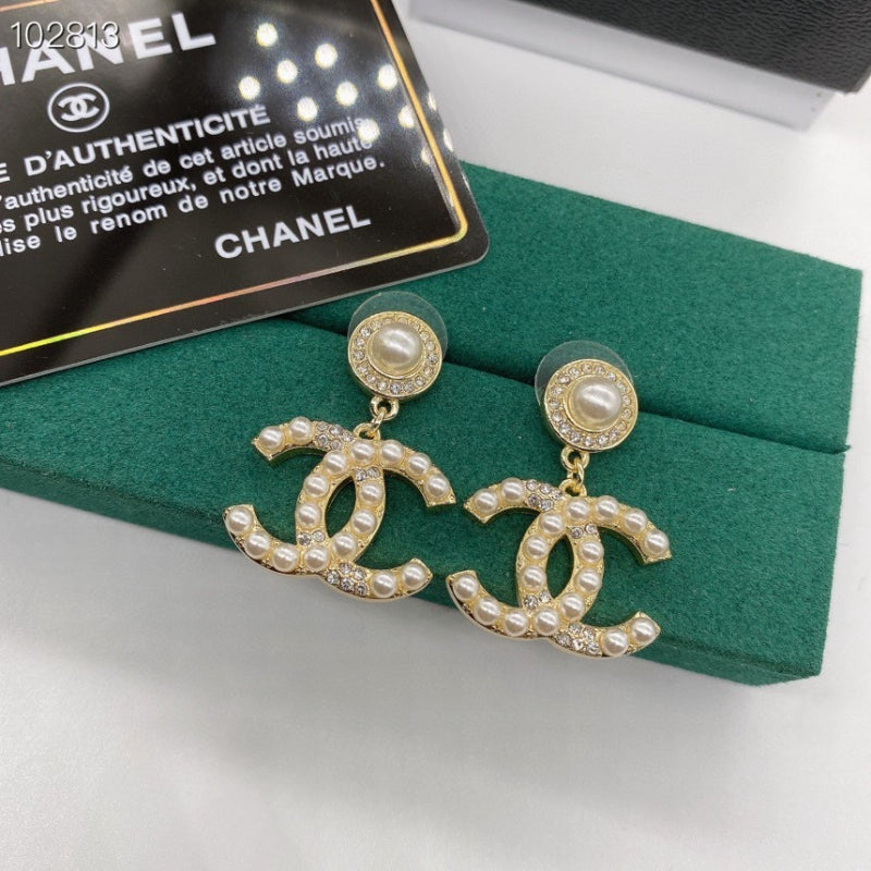 Boucles d’oreilles pendantes à fermoir en C entrelacé, effet nacré et texturé