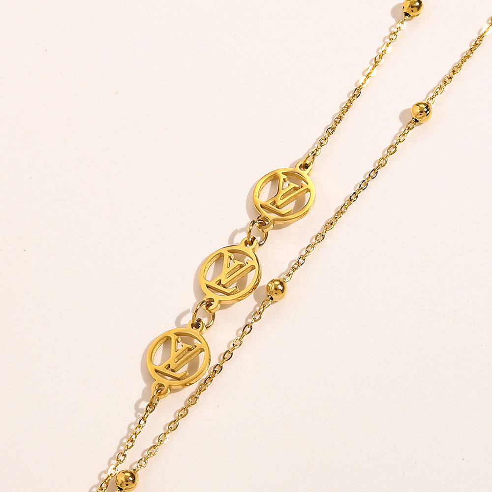 Collar tipo Y con inicial de acero inoxidable 304 y dije de corazón