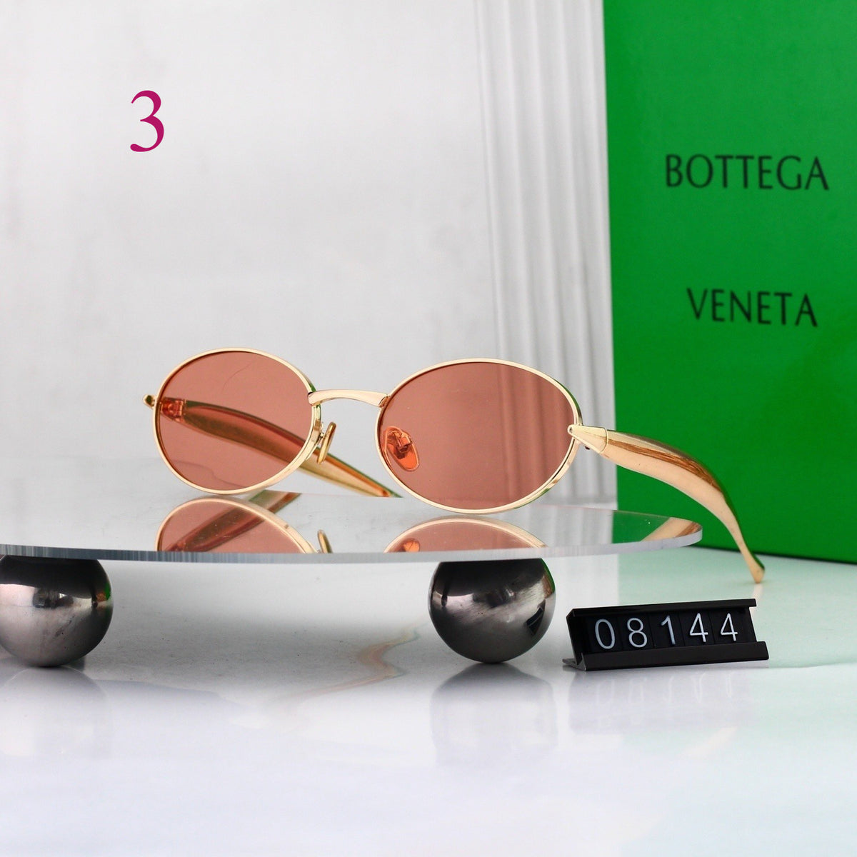 Gafas de sol redondas con patillas de metal texturizado