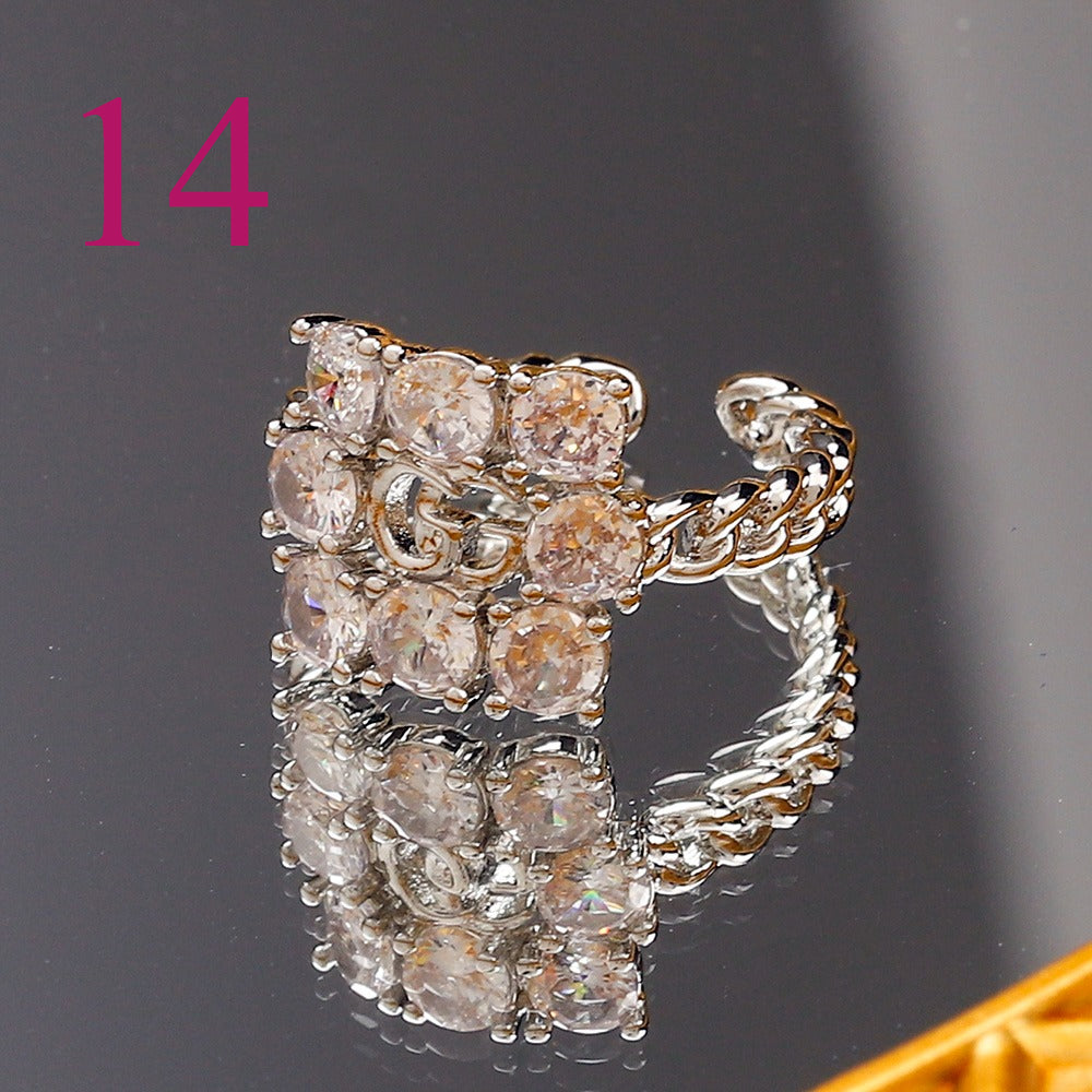 Textured Open Band Ring with Interlocking Emblem
