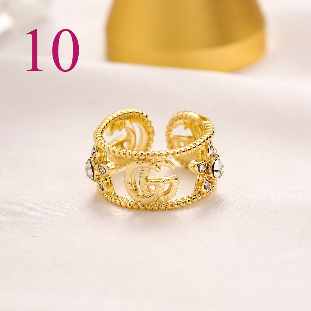 Textured Open Band Ring with Interlocking Emblem