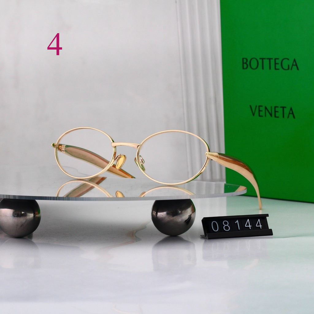 Gafas de sol redondas con patillas de metal texturizado