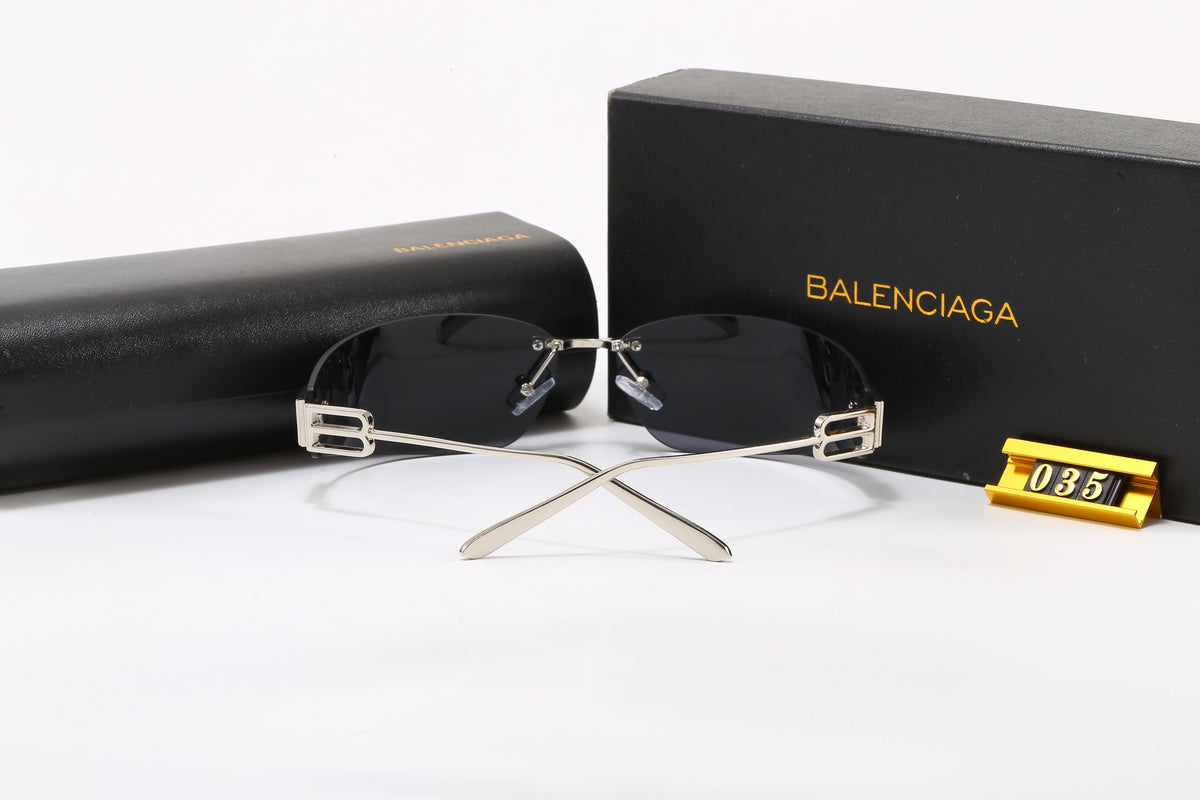 Lunettes de soleil rectangulaires sans monture avec détail sculpté sur la branche