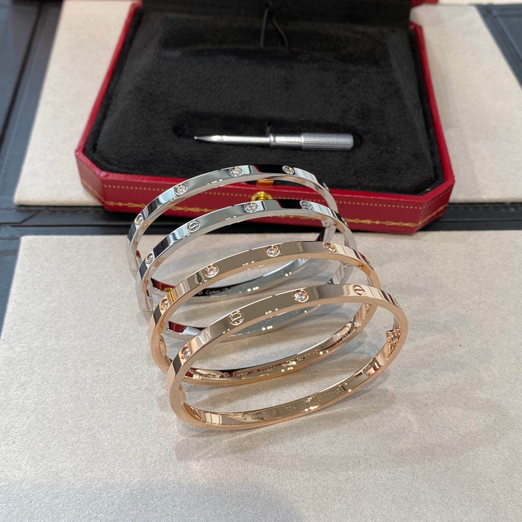 Bracelet jonc poli à détails vissés